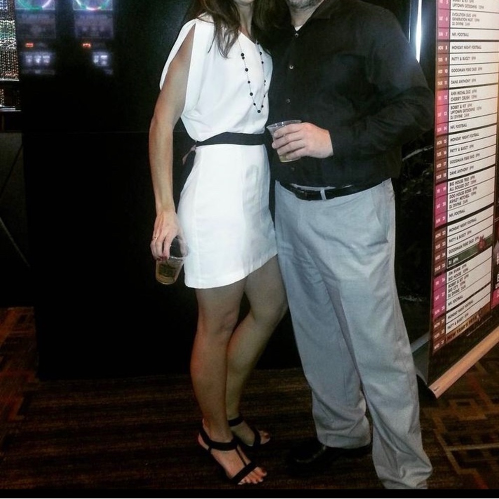 Sexy Cream i•ner sleeveless dolman style mini dress with black tie belt.